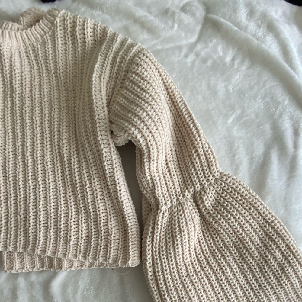 Cropped sweater with bell sleeves